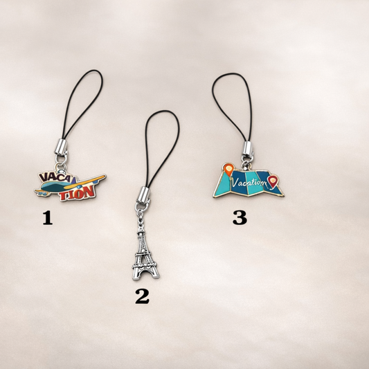 Three phone charm options with different designs on a beige background